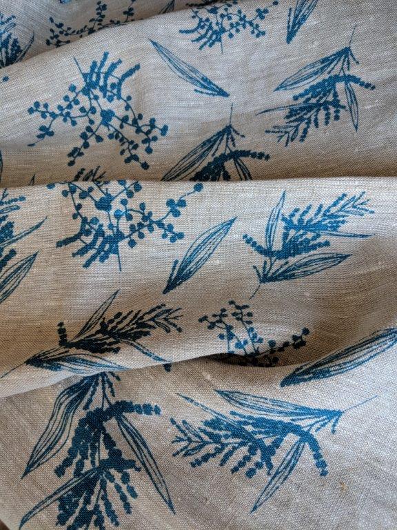 hand printed linen tea towel sea blue wattle print folded