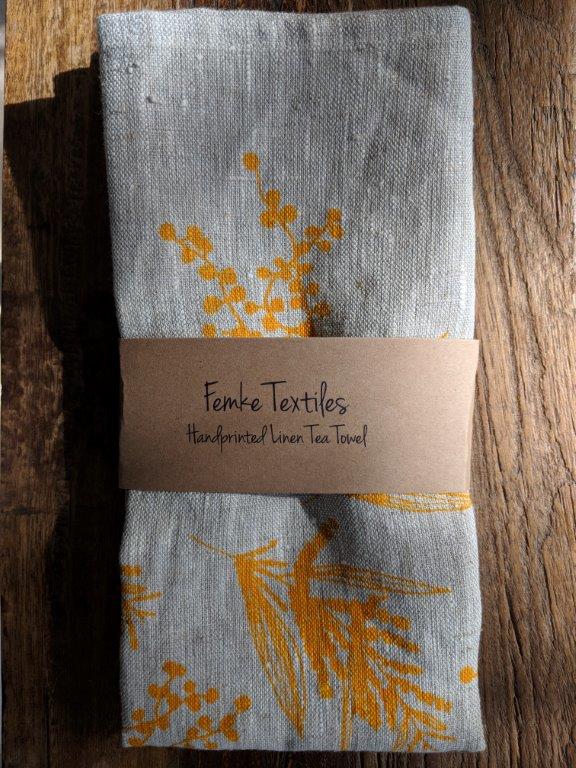 hand printed linen tea towel with yellow wattle design single packet